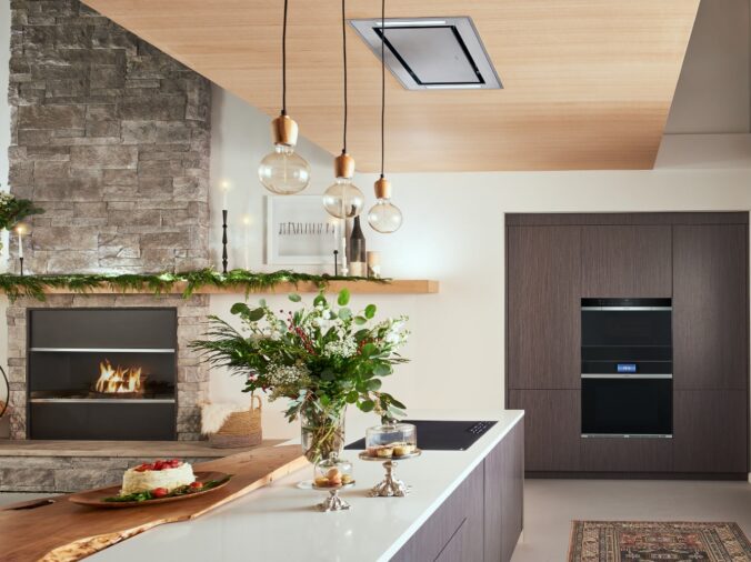 Modern kitchen with island and black appliances