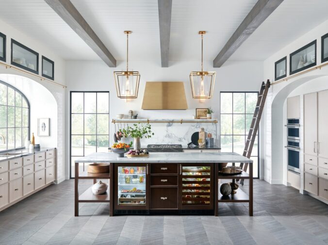 bright white kitchen with brown wood kithenc table