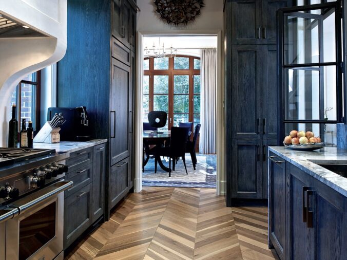 Rustic kitchen with bluew walls and hardwood floor