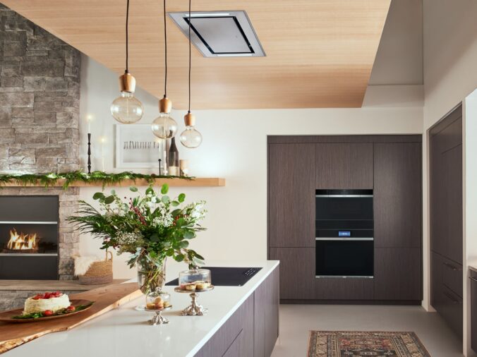 Modern kitchen with island and black appliances